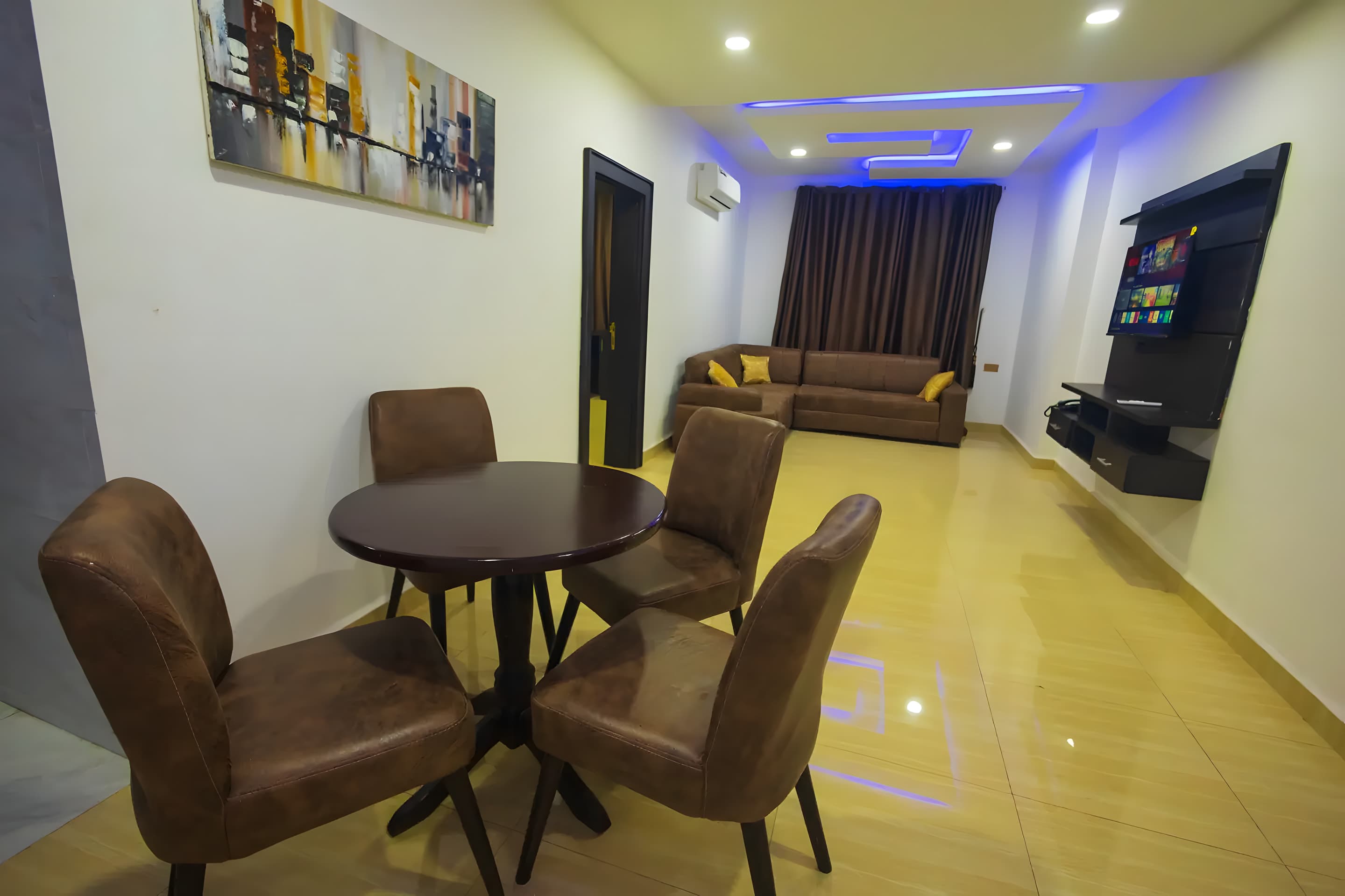 Executive Room at Diplomat Enclave Suites with a king bed and executive workspace