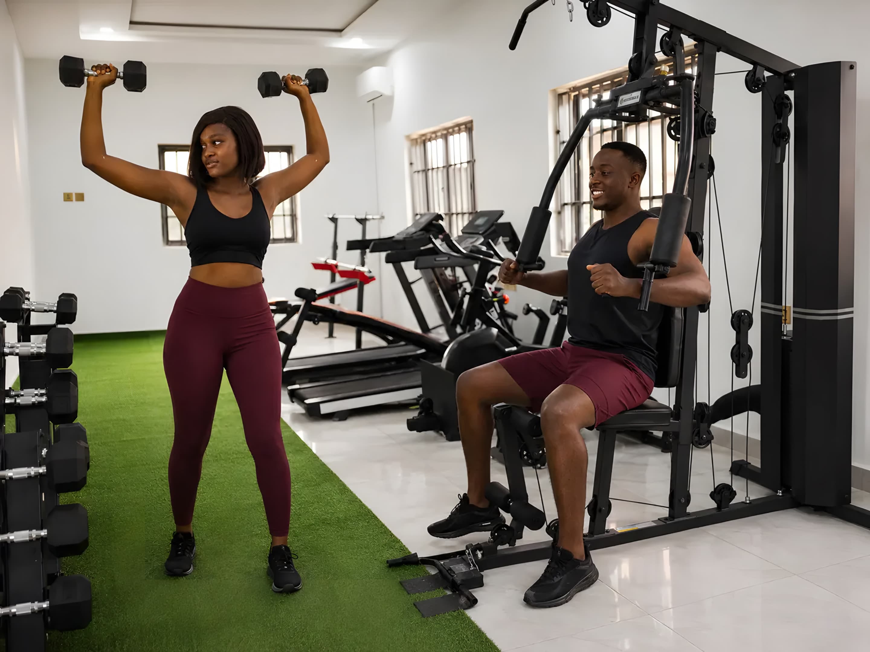 Strength-training equipment in the Diplomat Enclave Suites gym